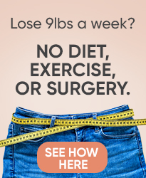 measuring tape around waist showing weight loss progress concept